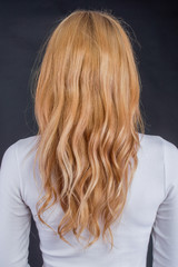 Naklejka premium Woman hairstyle with colored ribbons and colored hair