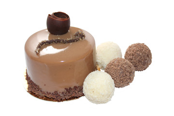 Chocolate cake with truffle candies (image with clipping path)