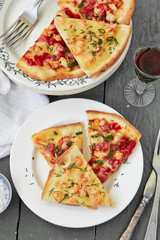 Assorted Italian pizza: pizza with shrimp and pizza with chicken and peppers.top view