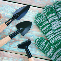 Garden tools - gloves, rakes and blades. Top view