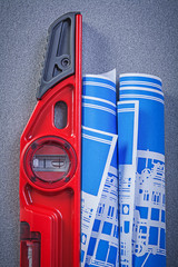 Fototapeta premium Construction level blue engineering drawings on grey background 