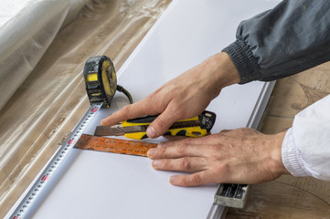 Building materials, PVC panels cut with a ruler, tape measure