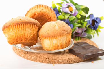 Composition from cakes, chocolate and flowers