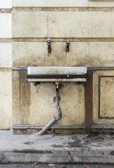 Public sink in street.