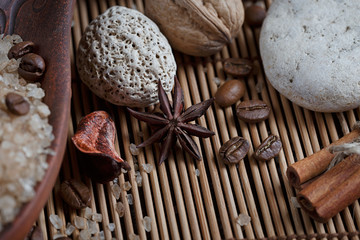 SPA concept: natural sea salt with coffee beans, cinnamon and an