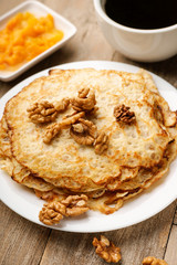 Pancakes, jam, walnuts and coffee 