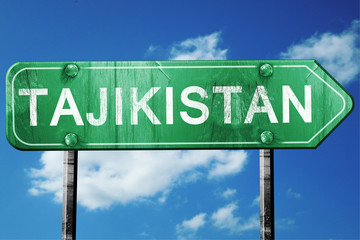 Tajikistan, 3D rendering, a vintage green direction sign