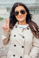 Portrait of a young girl wearing sunglasses.