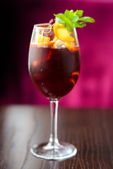 wine cocktail with mint garnish.