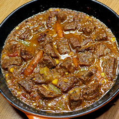 Skillet Stew with vegetables sizzling square