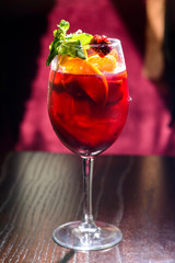 wine cocktail with mint garnish.