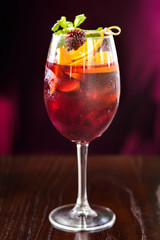 wine cocktail with mint garnish.