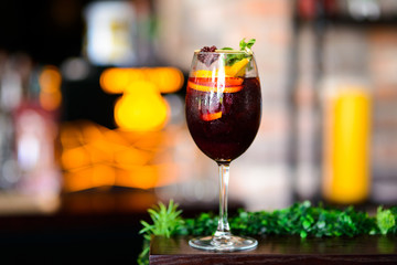 wine cocktail with mint garnish.