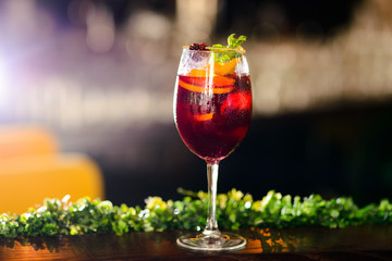wine cocktail with mint garnish.