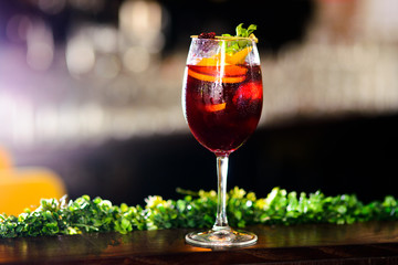 wine cocktail with mint garnish.