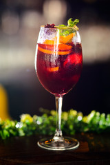wine cocktail with mint garnish.