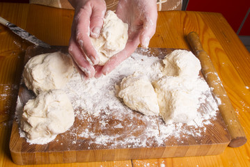 Making dough by female hands