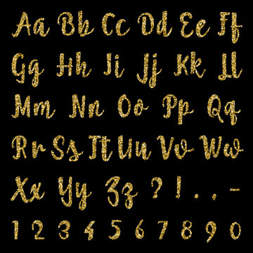 Gold alphabet isolated on black background.