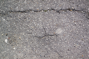 Obraz premium Asphalt texture with cracks