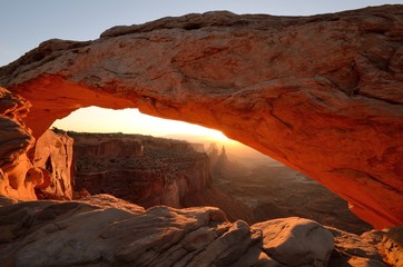 Fototapeta na wymiar Mesa Arch Glowing at Sunrise