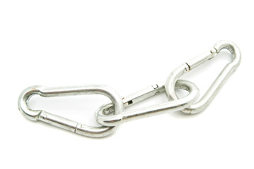three iron carabiner on white
