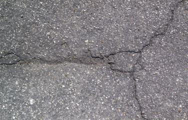 Obraz premium Asphalt texture with cracks