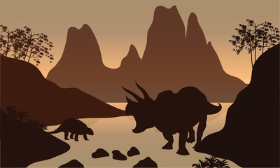 Silhouette of ankylosaurus in river