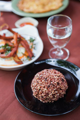 Brown Rice or Unpolished Rice in black plate on table
