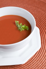 tomato soup bowl with garnish
