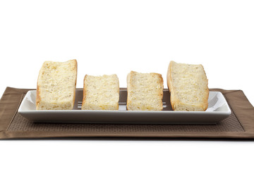 a plate with toasted bread