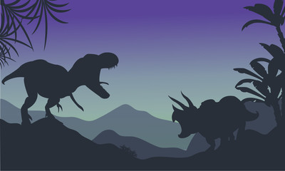 Silhouette of ankylosaurus and tyrannosaurus