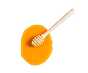 honey with wood stick on white background