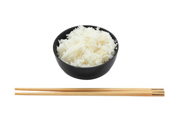White steamed jasmine rice in black ceramic bowl with wood chopsticks isolate on white background , (with clipping path)
