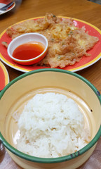 White jasmine streamed rice in metal bowl