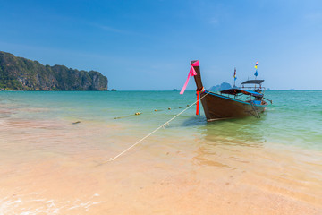 Traditional long-tail boat on the Ao Nang beach, Krabi, Thailand