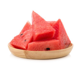 Slice of watermelon on wood plate