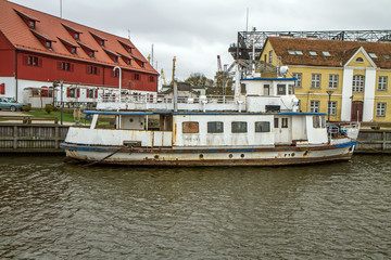 Fototapeta na wymiar Old boat in river