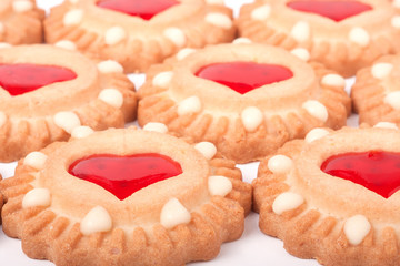 cookies with jelly and hearts as a background