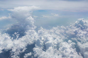 Above the clouds.Aerial cloudscape sky in stratosphere shot from airplane window © Glebstock