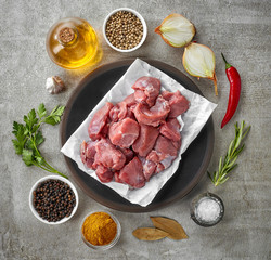 raw meat and various spices