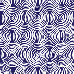 white spirals on a blue background