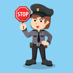 police women holding stop sign