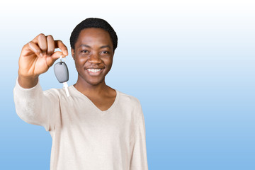 Fototapeta premium Young man with the keys standing