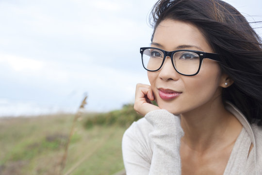 Thoughtful Chinese Asian Woman Girl Wearing Glasses