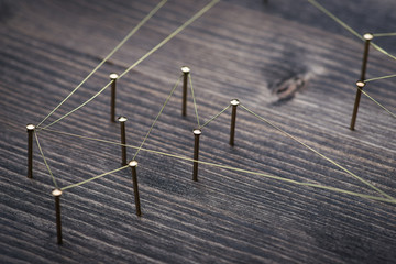 Web of wires, showing connections between groups and singles