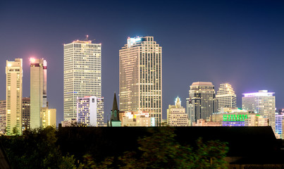 Fototapeta na wymiar Lights of New Orleans, LA. City skyline at night