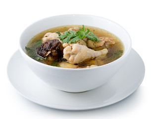 Traditional chicken broth on white background