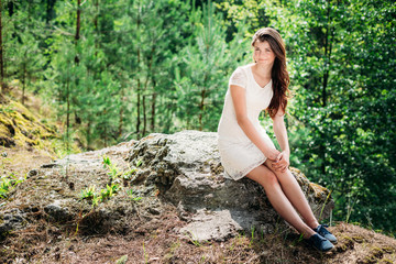 Beautiful Cute Young Smiling Woman Girl In White Dress Sitting O