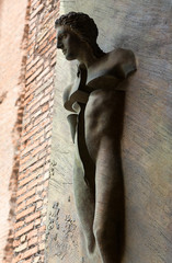 Rome - The artistic detail from door to the Basilica of St. Mary of the Angels and the Martyrs . Italy