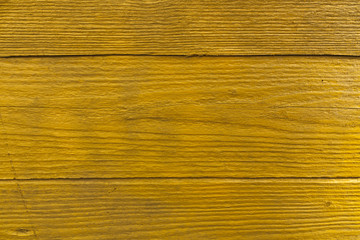 Orange grungy wooden wall texture.